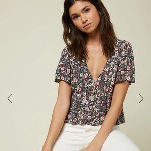 Brand new, with tag. Floral O’Neill top